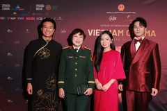 Director Dang Thai Huyen (second from left) and actors of 'Red Rain'. (Photo courtesy of VFDA)