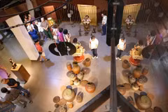People visit an exhibition space at a creative design festival. (Photo: VNA)
