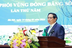 Prime Minister Pham Minh Chinh addresses the fifth meeting of he Coordinating Council for Red River Delta Region in Hanoi on January 14 (Photo: VNA)