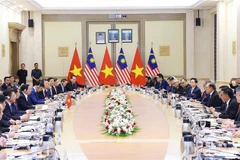 The talks between Vietnamese Prime Minister Pham Minh Chinh and his Malaysian counterpart Anwar Ibrahim in Kuala Lumpur on May 25 (Photo: VNA)