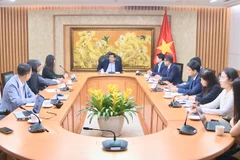 Deputy Prime Minister Nguyen Chi Dung (centre) hails the NAB Innovation Centre Vietnam’s achievements, particularly its contributions to developing high-quality technology human resources and supporting Vietnam’s innovation and digital transformation ecosystem. (Photo: VGP)