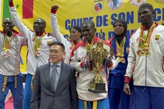 Vietnamese Ambassador to Algeria and Senegal Tran Quoc Khanh and winners of the 2025 Vietnam Ambassador Vovinam Cup. (Photo: VNA)