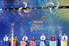 Officials mark the opening of the 22nd Ho Chi Minh City Tourism Festival on April 2. (Photo: VNA)