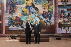 Deputy Minister of Agriculture and Environment Tran Thanh Nam and Mexican Secretary of Agriculture and Rural Development Julio Berdegué Sacristán in Mexico City. (Photo: VNA)