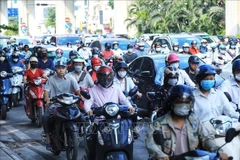 Emission inspections for motorcycles and motorised vehicles will begin in Hanoi and Ho Chi Minh City on July 1, 2027. (Photo: VNA)