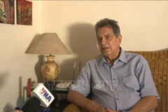 Fredesmán Turró González, former Cuban Ambassador to Vietnam and Vice President of the Cuba-Vietnam Friendship Association, talks to VNA correspondents in Havana (Photo: VNA)