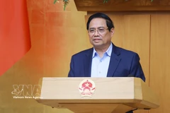 Prime Minister Pham Minh Chinh addresses the Government’s regular meeting for February on March 4. (Photo: VNA)