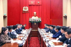 Minister of Public Security General Luong Tam Quang hosts a reception for Kerry Person, Vice President of Data Centre Planning at Amazon Web Services (AWS) - part of Amazon in Hanoi on March 4 (Photo: VNA)