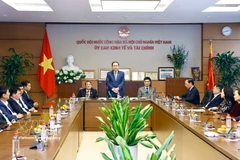 National Assembly Chairman Tran Thanh Man (centre) addresses at the working session with the NA Committee for Economic and Financial Affairs on February 23. (Photo: VNA)