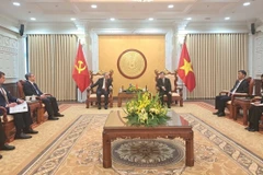 The meeting between Chief Justice of the Supreme People's Court Le Minh Tri and Prosecutor General of Azerbaijan Kamran Bayram Aliyev in Hanoi on March 24. (Photo: VNA)