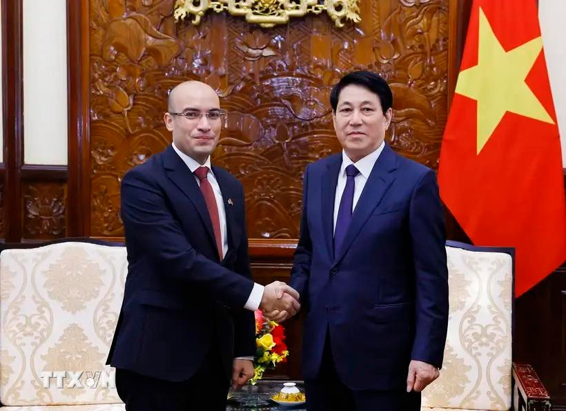 State President Luong Cuong (R) receives Algerian Ambassador to Vietnam Sofiane Chaib. (Photo: VNA)