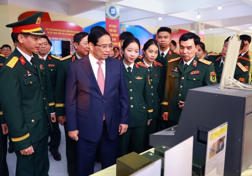 PM Pham Minh Chinh visits the area displaying the MTA's products (Photo: VNA)