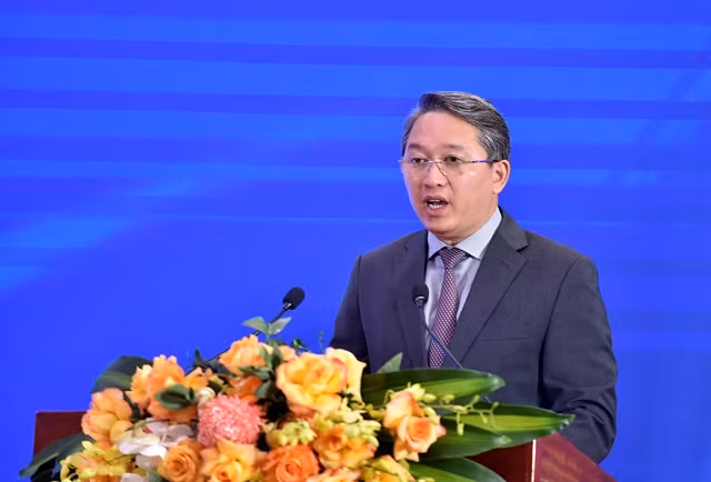 Minister of Justice Nguyen Hai Ninh speaks at the event (Photo: baochinhphu.vn)