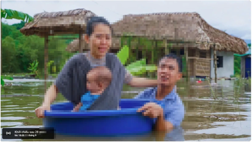 A staged photo from a YouTuber's video clip is spread as that of a family evacuating from flooding. (Photo: Screenshot)