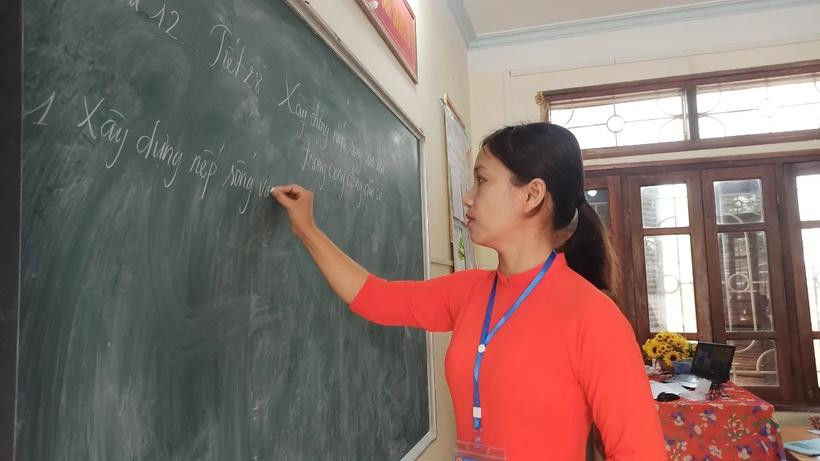 The Ministry of Education and Training is making efforts to finalise the draft Teachers’ Law. (Photo: VietnamPlus)