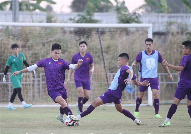 Vietnamese players seen in a training session in Vientiane on December 7. Vietnam will play Laos in the first match of Group B at the 2024 ASEAN Cup on December 9 evening. (Photo: VFF) 