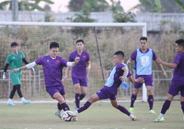 Vietnamese players seen in a training session in Vientiane on December 7. Vietnam will play Laos in the first match of Group B at the 2024 ASEAN Cup on December 9 evening. (Photo: VFF) 