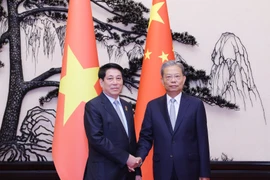 State President Luong Cuong (L) meets with Zhao Leji, member of the Standing Committee of the Political Bureau of the Communist Party of China (CPC) Central Committee and Chairman of the Standing Committee of the National People’s Congress (NPC) of China on September 4. (Photo: VNA)