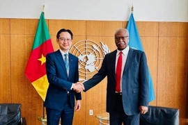 Ambassador Do Hung Viet, Permanent Representative of Vietnam to the UN (L), and President of the 79th session of the UN General Assembly Philemon Yang (Photo: VNA)