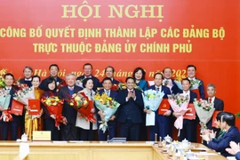 At the conference to announce the decisions of the Government's Party Committee on the establishment of the 15 new Party organisations in Hanoi on February 24. (Photo: VNA)