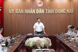 Vice Chairman of the Dong Nai provincial People’s Committee Ho Van Ha speaks at the working session with Construction Corporation No.1 on September 9. (Photo: VNA)