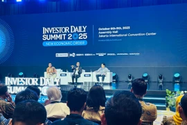 The Investor Daily Summit gathers investors, policymakers, business leaders, and global economists. (Photo: VNA)
