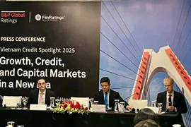 At the press conference on Vietnam Credit Spotlight 2025 hosted by S&P Global Ratings and FiinRatings on February 27. (Photo: VietnamPlus)