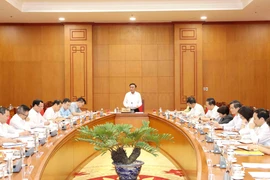 A meeting chaired by Politburo member and Permanent Member of the Party Central Committee’s Secretariat Tran Cam Tu with Party committees, central agencies, and mass organisations on October 16 (Photo: VNA)