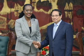 Prime Minister Pham Minh Chinh (R) receives Kenya's Cabinet Secretary for Defence Soipan Tuya in Hanoi on April 16. (Photo: VNA)