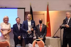 Belgium golf tournament raises funds for AO victims