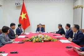 Prime Minister Pham Minh Chinh holds phone talks with his Malaysian counterpart Anwar Ibrahim on April 6. (Photo: VNA)