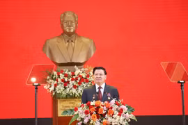 LPRP General Secretary and President of Laos Thongloun Sisoulith speaks at the grand ceremony in Vientiane on March 22. (Photo: VNA)
