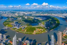 A view of Thu Thiem New Urban Area in Thu Duc city seen from downtown District 1. HCM City will begin construction of a seven-billion-USD IFC this month. (Photo: VNA)