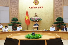At the Government meeting on the implementation of the two-tier local government model in Hanoi on October 29 (Photo: VNA)