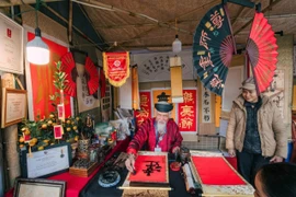 Vietnamese traditional calligraphy during Tet