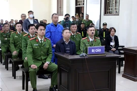 At the court in Thai Binh province on January 13 to hand down verdicts to National Assembly deputies Luu Binh Nhuong and Le Thanh Van as well as their associates. (Photo: VNA)