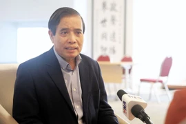 Professor Vu Minh Khuong from the Lee Kuan Yew School of Public Policy in Singapore (Photo: VNA)