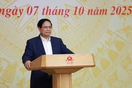 Prime Minister Pham Minh Chinh presides over the 16th session of the National Steering Committee on combating IUU fishing on October 7. (Photo: VNA)