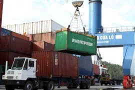 Trade promotion and market diversification must be enhanced to maintain two-digit export revenue growth. (Photo: VietnamPlus)