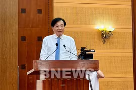 Minister-Chairman of the Government Office Tran Van Son speaks at the press briefing on July 3. (Photo: VNA)