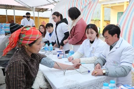 Basic social services like healthcare, education, clean water, and information access have been expanded to meet the needs of rural residents, especially ethnic minority communities. (Photo: VietnamPlus)