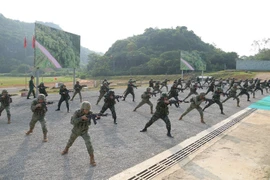 Throughout the 10-day event, the two ground forces maintain close coordination and strictly follow training plans. (Photo: VNA) 