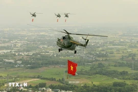 Helicopters, fighter jets soar over Ho Chi Minh City skies