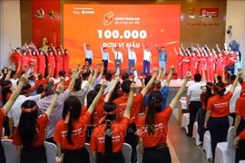 At the launch of the Red Journey blood donation campaign. (Photo: VNA)