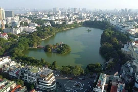 Hoan Kiem Lake, also known as the Lake of the Returned Sword, is a cultural landmark in Hanoi. (Photo: VNA)