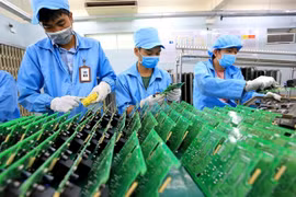 Electronic components are manufactured at the Central Power Electronic Measurement Equipment Manufacturing Center in Da Nang city. (Photo: VNA) 