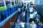 Passengers at a station of the Nhon - Hanoi Station metro line (Photo: VNA)