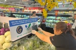 Vegetables with a green tick at a supermarket in Ho Chi Minh City. (Photo: VNA)