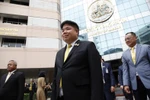 Newly installed Labour Minister Pongkawin Jungrungruangkit on his first day at the ministry. (Photo: Bangkok Post)