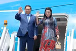 PM Pham Minh Chinh and his spouse (Photo: VNA)